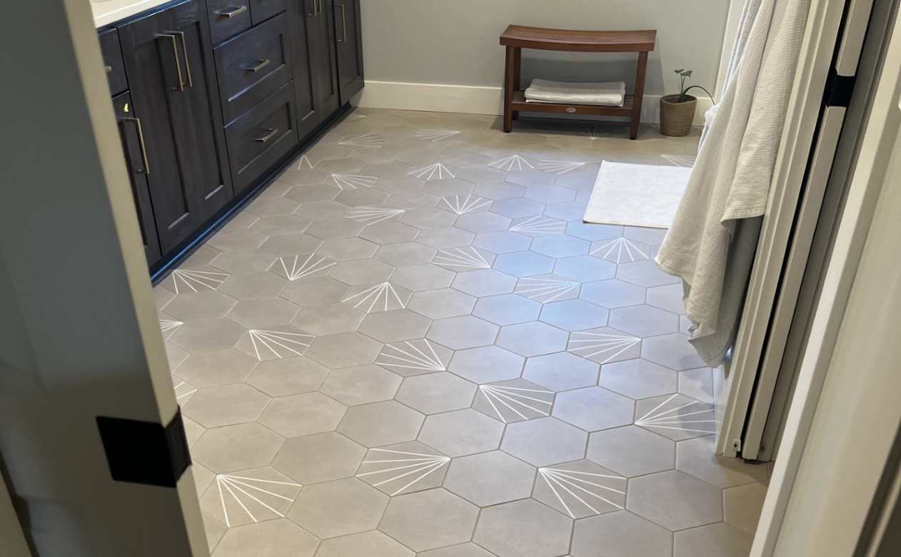 modern bathroom with gray patterned hexagon tile flooring